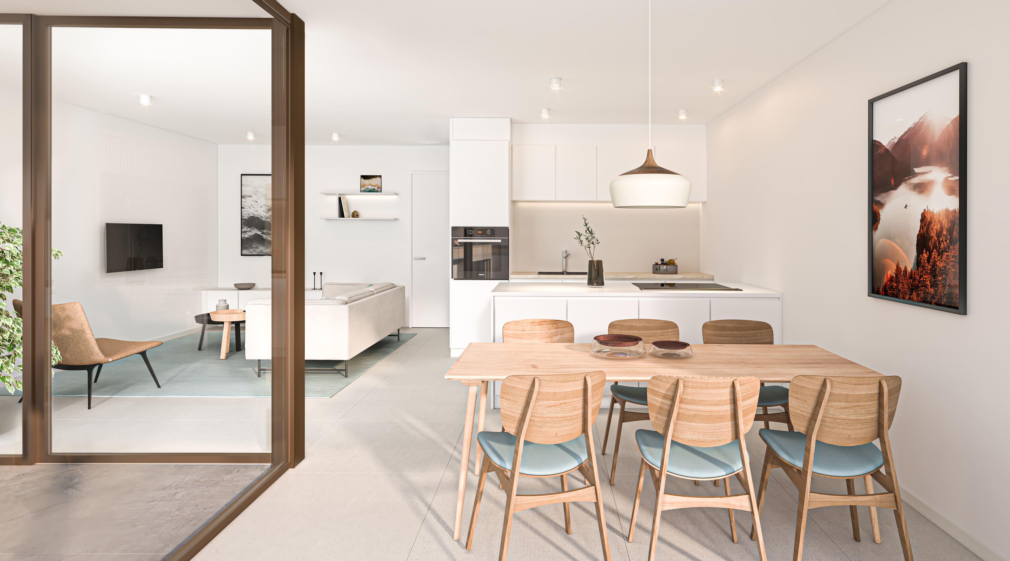 Interieur leefruimte met eettafel, keuken en zetel appartement Eymard