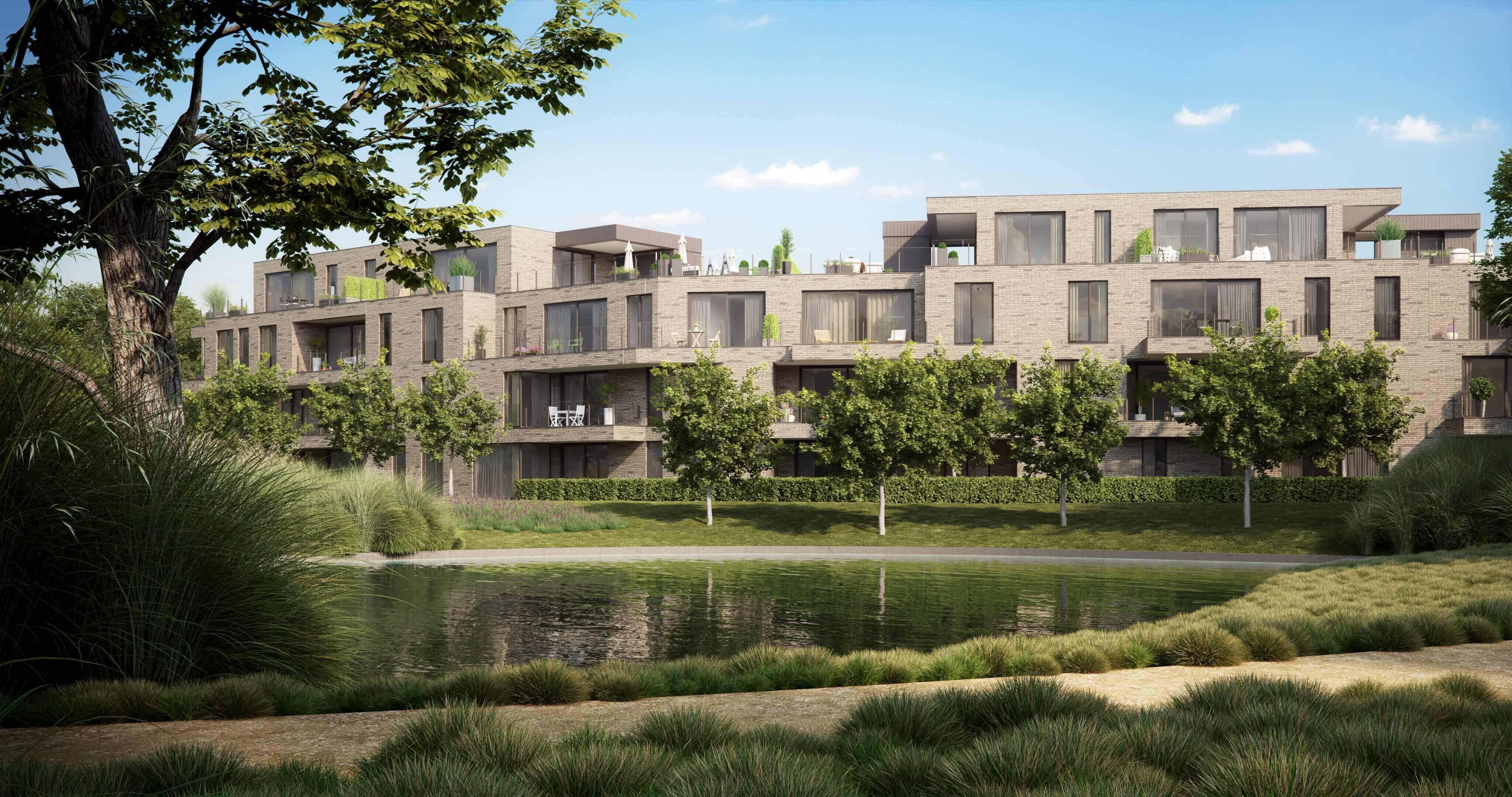 Parktuin en vijver met op achtergrond appartementsgebouwen project Jabit\'O